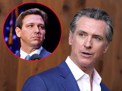 Florida's Republican Gov. Ron DeSantis takes to the stage to debate his Democratic opponent Charlie Crist in Fort Pierce, Fla., on Oct. 24, 2022. Both DeSantis a Republican and California Gov. Gavin Newsom, a Democrat said their reelection victories were in part because of their commitment to freedom. But the …
