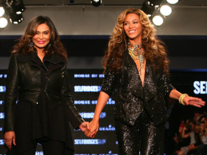 Beyonce Knowles takes the applause with her mother Tina Knowles (left) following their House of Dereon Catwalk Show at Selfridges, London, shown as part of London Fashion Week (Photo by Gareth Fuller/PA Images via Getty Images)