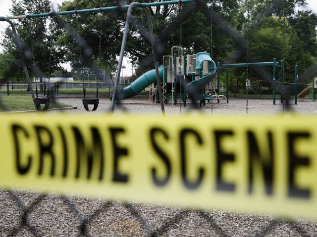 A playground near the baseball field is cordoned off with police tape as the investigation continue at the scene in Alexandria, Va., Thursday, June 15, 2017, the day after House Majority Whip Steve Scalise of La. was shot during during a congressional baseball practice. (AP Photo/Jacquelyn Martin)