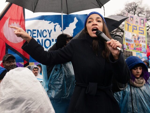 US Representative Alexandria Ocasio-Cortez, Democrat of New York, speaks during the March For TPS(temporary protected status) Justice rally in support of DACA (Deferred Action for Childhood Arrivals)recipients and temporary protected status holders as demonstrators protest for permanent residency outside the White House in Washington, DC, February 12, 2019. (Photo by …