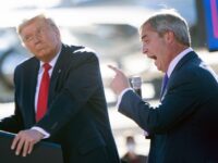 US President Donald Trump listens as Nigel Farage (R) speaks during a Make America Great Again rally at Phoenix Goodyear Airport October 28, 2020, in Goodyear, Arizona. (Photo by Brendan Smialowski / AFP) (Photo by BRENDAN SMIALOWSKI/AFP via Getty Images)