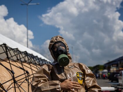 TOPSHOT - An Ukrainian Emergency Ministry rescuer attends an exercise in the city of Zaporizhzhia on August 17, 2022, in case of a possible nuclear incident at the Zaporizhzhia nuclear power plant located near the city. - Ukraine remains deeply scarred by the 1986 Chernobyl nuclear catastrophe, when a Soviet-era …