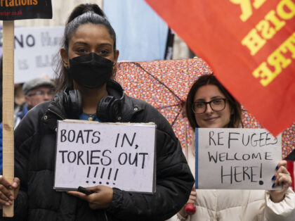 LONDON, UNITED KINGDOM - MARCH 18: Pro-migrant protesters gather in the Portland Place Street during a demonstration against government's controversial immigration bill, in London, United Kingdom on March 18, 2023. The UK government introduced a bill in parliament to stop asylum seekers from crossing the English Channel in small boats. …