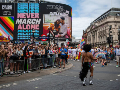 Participants march through Piccadilly Circus during The Pride in London Parade in London, UK, on Saturday, July 1, 2023. Pride flags are flying over London for today's annual LGBTQ parade. More than 1.5 million people attended last year, organizers said. Photographer: Chris J. Ratcliffe/Bloomberg via Getty Images