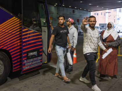 NEW YORK, NEW YORK - SEPTEMBER 25: Buses of migrants who have been detained at the Texas border continue to arrive in New York, September 25, 2022 at the Port Authority bus terminal in midtown New York City, New York. With the city shelter system full, the migrants are still …