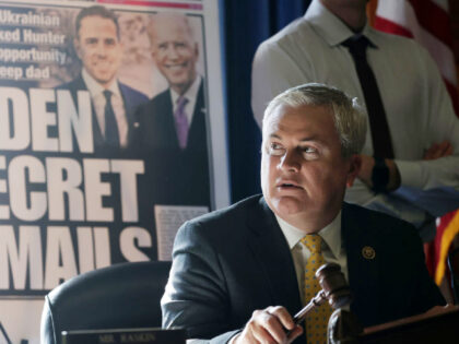 WASHINGTON, DC - FEBRUARY 08: With a poster of a New York Post front page story about Hunter Biden’s emails on display, Committee Chairman Rep. James Comer (R-KY) announces a recess because of a power outage during a hearing before the House Oversight and Accountability Committee at Rayburn House Office …