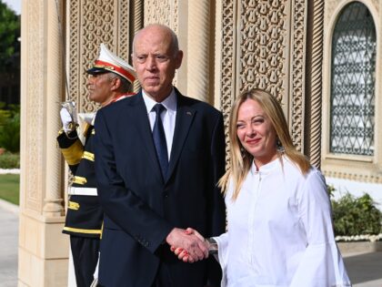 TUNIS, TUNISIA - JULY 16: (----EDITORIAL USE ONLY â" MANDATORY CREDIT - "TUNISIAN PRESIDENCY / HANDOUT" - NO MARKETING NO ADVERTISING CAMPAIGNS - DISTRIBUTED AS A SERVICE TO CLIENTS----) Tunisian President Kais Saied (L) welcomes Prime Minister of Italy Giorgia Meloni (R) ahead of the meeting at the Presidential Palace …