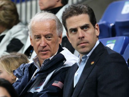 United States vice-president Joe Biden (L) and his son Hunter Biden (R) attend a women's ice hockey preliminary game between United States and China at UBC Thunderbird Arena on February 14, 2010 in Vancouver, Canada. (Bruce Bennett/Getty Images)