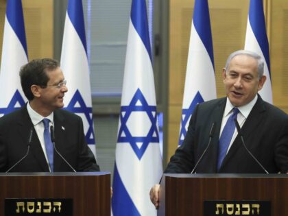 Isaac Herzog and Benjamin Netanyahu (Ronen Zvulun / Pool via Associated Press)
