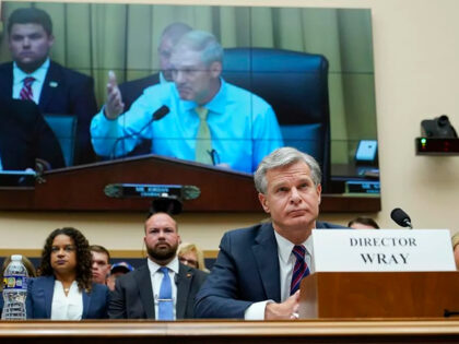 FBI Director Christopher Wray listens as Rep. Jim Jordan, R-Ohio, chair of the House Committee on the Judiciary, speaks during an oversight hearing, Wednesday, July 12, 2023, on Capitol Hill in Washington. (AP Photo/Patrick Semansky)