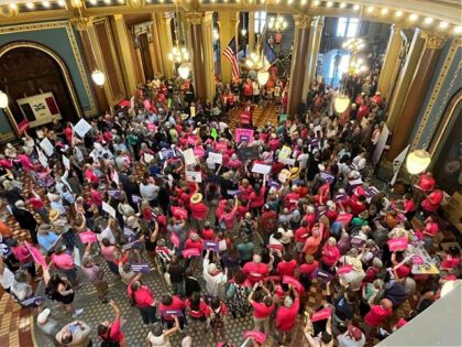 Iowa Democrat Jennifer Konfrst speaks to protesters rallying at the Iowa Capitol rotunda in opposition to the new ban on abortion after roughly six weeks of pregnancy introduced by Republican lawmakers in a special session on Tuesday, July 11, 2023. (AP Photo/Hannah Fingerhut)