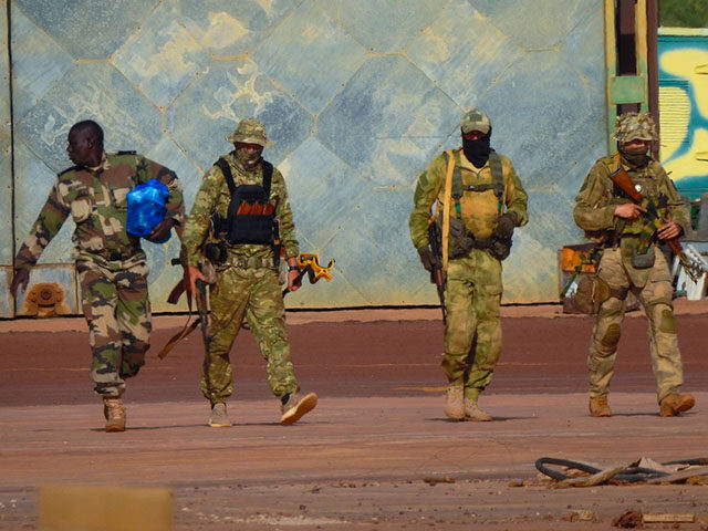 This undated photograph handed out by French military shows three Russian mercenaries, right, in northern Mali. Russia's Wagner Group, a private military company led by Yevgeny Prigozhin, a rogue millionaire with longtime links to Russia's President Vladimir Putin, has played a key role in the fighting in Ukraine and also …