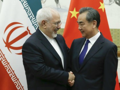Iran - Chinese State Councillor and Foreign Minister Wang Yi meets Iranian Foreign Minister Mohammad Javad Zarif at Diaoyutai state guesthouse on May 13, 2018 in Beijing, China. (Photo by Thomas Peter - Pool / Getty Images)