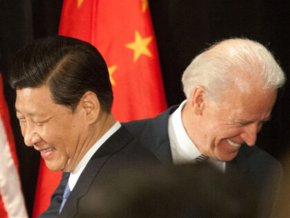 China - Chinese Vice President Xi Jinping and U.S. Vice President Joe Biden at a luncheon hosted by the Mayor's office. (Photo by Tim Rue/Corbis via Getty Images)