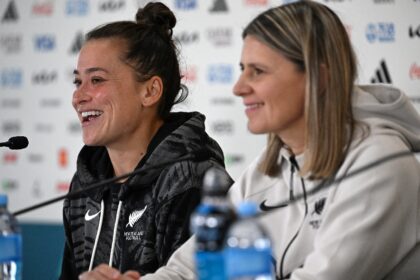 New Zealand’s Ali Riley (L) and coach Jitka Klimkova at a press conference at Eden Park in Auckland